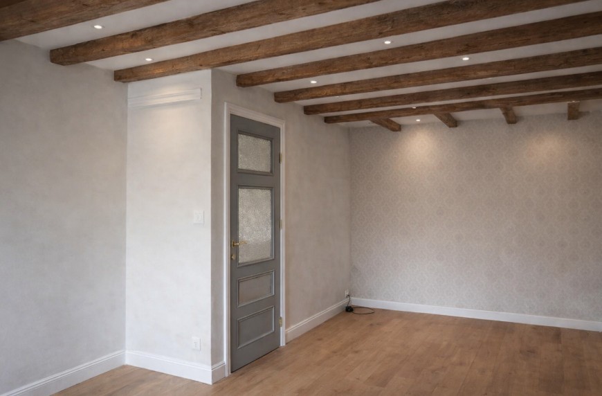 Rénovation intérieure appartement Lyon 1 — poutres apparentes et revêtements